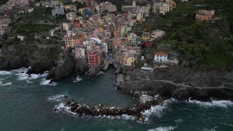 Riomaggiore-Cinque-Terre-Italy-aerial-cloudy-day-on-the-ocean