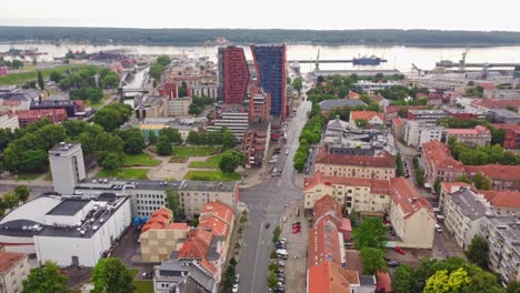 Iconic-Klaipeda-city-skyscrapers-and-downtown,-aerial-drone-view