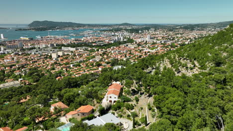 Establishing-Aerial-View-of-Toulon-City-and-the-Naval-Port---Sunny-Day