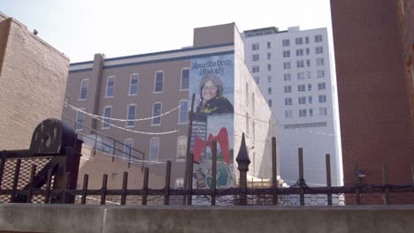 Maurilla-Ortiz-Blakely-murual-on-a-building-in-downtown-Grand-Rapids,-Michigan-with-stable-wide-video-shot