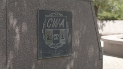 Communications-Workers-of-America-Founded-1947-sign-in-downtown-Grand-Rapids,-Michigan-with-stable-video-shot