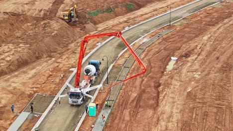 Aerial-view-of-concrete-pour-on-new-path-at-construction-site-in-Yarrawonga