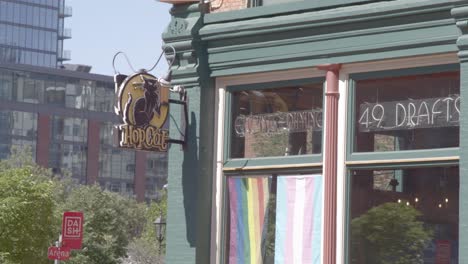 Hop-Cat-bar-and-restaurant-sign-in-downtown-Grand-Rapids,-Michigan-with-stable-video-shot