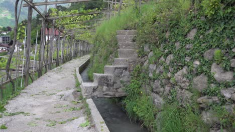 Part-of-the-irrigation-channel-hiking-path-in-Algund---Lagundo,-South-Tyrol,-Italy