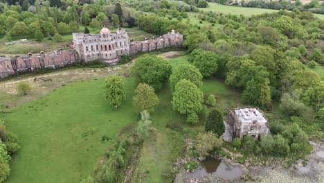 Unkempt-garden-by-abandoned-Hamilton-Palace-aka-Ghost-house-in-Sussex,-England