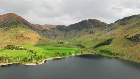 Aerial-view-towards-Haystacks,-fleetwith-Pike-and-High-Crag-from-Buttermere-Lake,-Cumbria,-UK