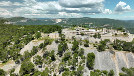 Aerial-flying-towards-Fort-de-la-Croix-Faron-on-sunny-day,-Toulon,-France