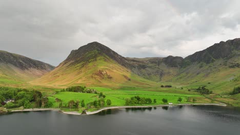 Stunning-aerial-view-over-Buttermere-Lake-on-a-spring-evening,-Cumbria,-England