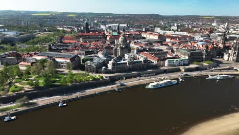 Dresden-Establishing-drone-high-aerial-view-of-city-with-cathedral-and-historic-city-center-altstadt-by-river,-Germany