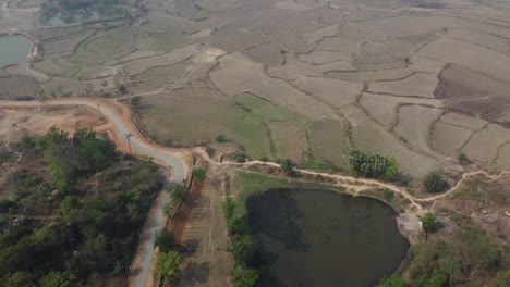 Drone-video-shot-of-vast-fields-after-harvest