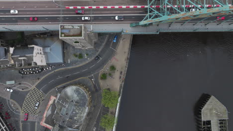 View-From-Above-Of-Vehicles-Driving-On-Tyne-Bridge-By-Quayside-In-Newcastle-Upon-Tyne,-UK