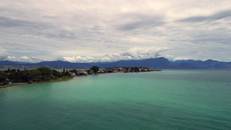 Aerial-view-with-a-drone-of-Scaligero-Castle-,-Built-in-the-latter-half-of-the-14th-Century-on-the-southernmost-part-of-Lake-Garda-in-Northern-Italy---4K-Stockvideo