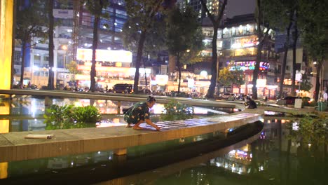 Elderly-woman,-preparation-temporary-seating,-city-landmark,-evening