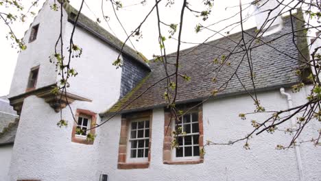 Abertarff-House-is-the-oldest-house,-built-in-1593-on-the-east-bank-of-River-Ness-in-Inverness,-Scotland-UK