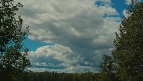 Timelapse-of-low-clouds-moving-over-a-quiet-rural-landscape
