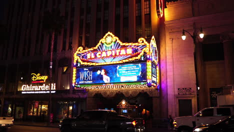 Los-Angeles-USA,-Hollywood-Boulevard-Traffic-and-El-Capitan-Theatre-at-Night