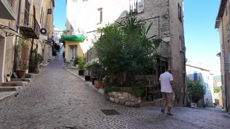 Provencal-village-with-narrow-streets,-cobbled-pathways-and-stone-houses,-charming-decorated-with-flowers-and-trees