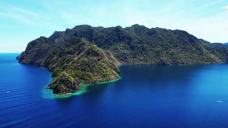 Gorgeous-Aerial-Drone-In-Paradise-Town-Of-Coron-With-Mountain-View