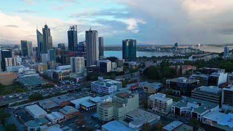 Skyscraper-Center-Of-Perth-On-Banks-Of-Swan-River-At-Dusk-In-Western-Australia,-Australia