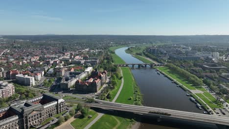 Dresden-Drone-over-German-city-establishing-aerial-shot-above-Elbe-river,-forward