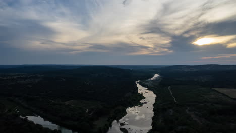 Fiery-sunset-hyper-lapse-over-the-Llano-River-outside-of-Mason,-Texas-in-the-Texas-Hill-Country