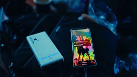 Portable-Power-Bank-Connected-To-A-Cellphone-For-Charging