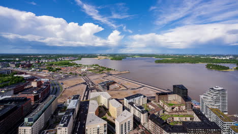 Timelapse-of-fluffly-clouds-moving-over-the-sunny-Verkkosaari-area-of-Helsinki