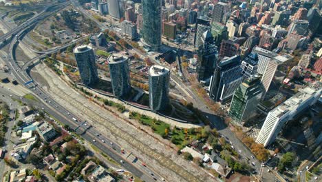 Aerial-Fly-slow-above-Titanium-Park-modern-architecture,-Santiago-de-Chile-City