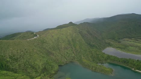 Lagoa-do-fogo-in-the-azores,-featuring-lush-green-mountains-and-serene-blue-lake,-aerial-view