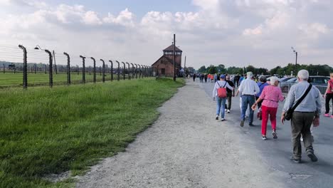 Tourists-At-Auschwitz-Concentration-Camp-In-Oświęcim,-Poland---Wide-Shot