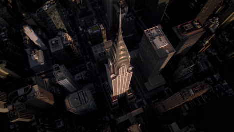 Birdseye-view-circling-the-Chrysler-Building,-golden-hour-in-Manhattan,-New-York