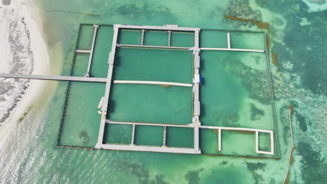 Overhead-drone-shot-of-an-embankment-near-the-beachfront-of-Bavaro-in-the-Dominican-Republic-in-the-Caribbean