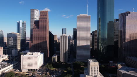 Downtown-Houston-TX-USA,-Drone-Shot-of-Skyscrapers,-Towers-and-City-Hall-Building