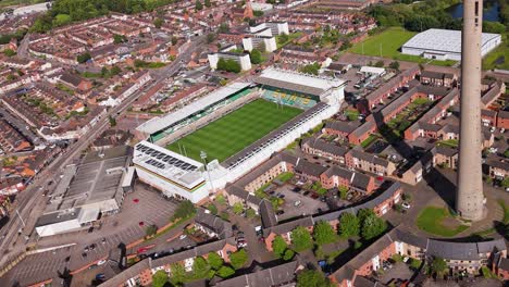 Northampton-Saints-rugby-stadium-and-National-lift-tower-aerial-view-circling-town-team-ground