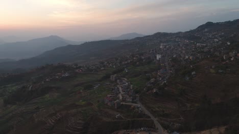 Himalayan-range-in-Nepal,-showing-an-urbanization-with-sunrise