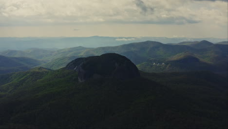 Aerial-view-orbiting-Looking-Glass-Rock-in-Blue-Ridge-Mountains-NC