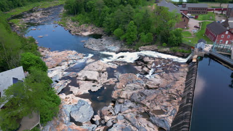 Aerial-pullback-of-natural-geologic-formation-of-Shelburne-Falls-Potholes-in-Deerfield-River,-Massachusetts,-USA