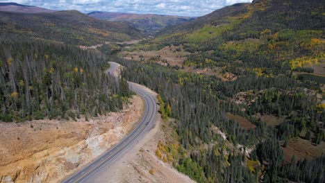 Aerial-View,-Traffic-on-Wolf-Creek-Pass,-Road-in-San-Juan-Mountain-Colorado-USA-on-Sunny-Day