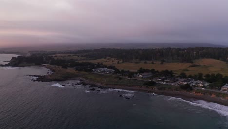 Rising-aerial-dolly-shot-of-Moonstone-Beach-during-sunset-in-Cambria,-California