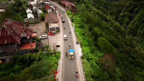 Aerial-drone-view-of-Kintamani-village-and-street,-Bali-in-Indonesia