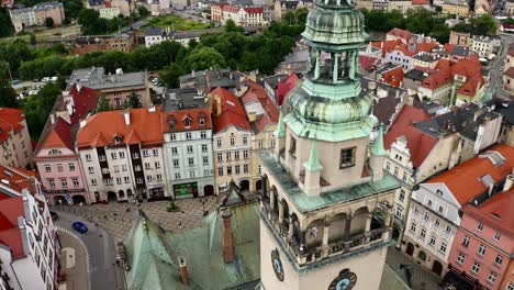 Aerial-View-Of-Historic-Town-Hall-Tower-Clock-In-Klodzko,-Poland