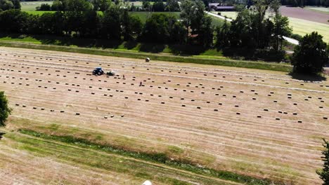 Baler-presses-hay-into-square-bales