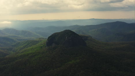 Aerial-orbiting-Looking-Glass-Rock-Brevard-NC-in-golden-morning-light