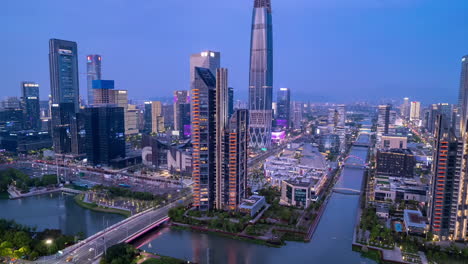 Fotografía-Aérea-De-La-Construcción-Del-Nuevo-Horizonte-De-La-Ciudad-Oriental-Y-Edificios-Modernos,-Escenario,-Escena-Nocturna,-Blues,-Time-lapse