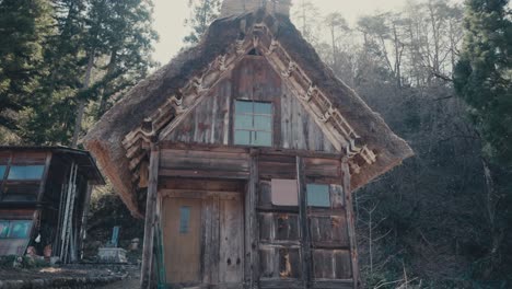 Wooden-With-Steep-Thatched-Roof-House-At-Shirakawa-go-Hamlet-In-Shirakawa,-Japan