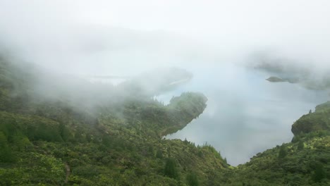 Lagoa-do-Fogo's-serene-beauty-captured-through-a-misty-morning-aerial-view