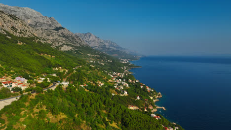 Establishing-drone-shot-of-the-Makarska-riviera-coastline-in-Croatia,-summer-day