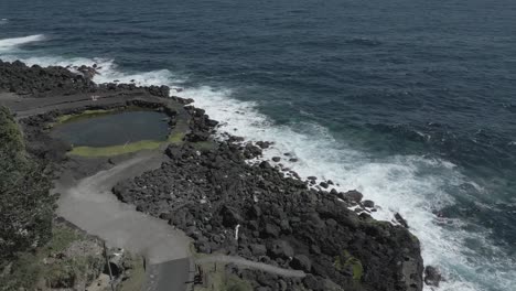 Waves-crashing-against-rugged-coastline-in-Santo-Antonio,-Azores-islands