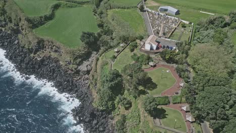 Chapel-of-Our-Lady-of-Rosary-and-Cemetery-on-cliffs-of-Santo-Antonio,-Sao-Miguel,-Portugal