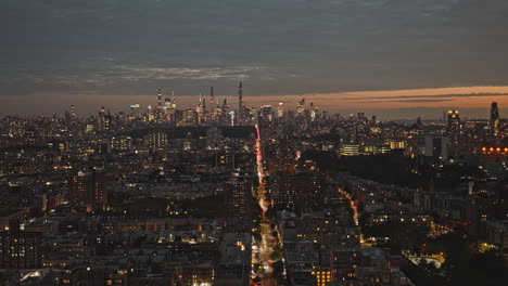 NYC-New-York-Aerial-v259-drone-flyover-Harlem-neighborhood-above-Frederick-Douglass-Boulevard-capturing-cityscape-of-Upper-Manhattan-on-the-skyline-at-sunset---Shot-with-Inspire-3-8k---September-2023